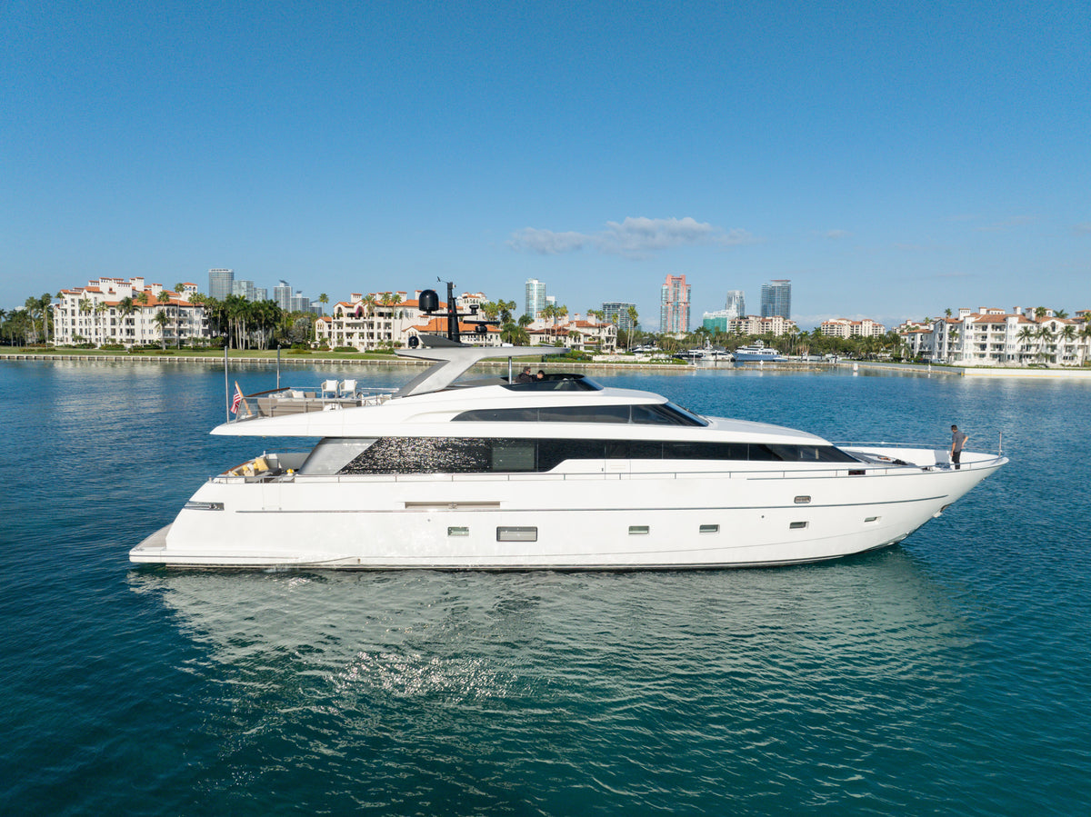 ASTONISH, a 97ft Sanlorenzo, seen from above cruising off Miami with her flybridge and foredeck in view